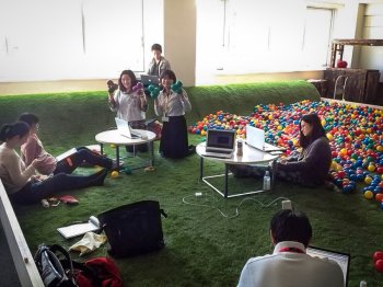 A snowboarder, a forklift operator, an exchange student and more: The TEDxSapporo translation team gets together for three hour meetings — in a playground-themed space — to work on translations. Photo: Courtesy of Ayana Ishiyama
